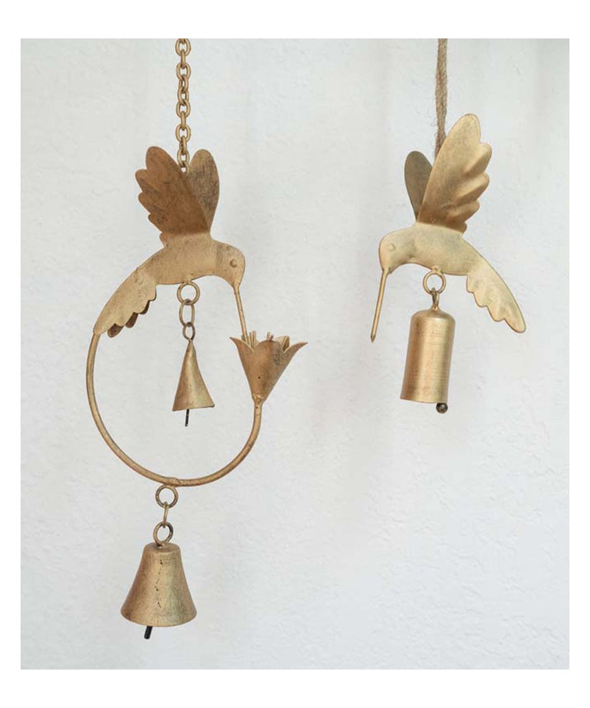Matr Boomie Mitra hummingbird and lily wind chime with metal tubes and delicate bird and flower designs, hanging outdoors.