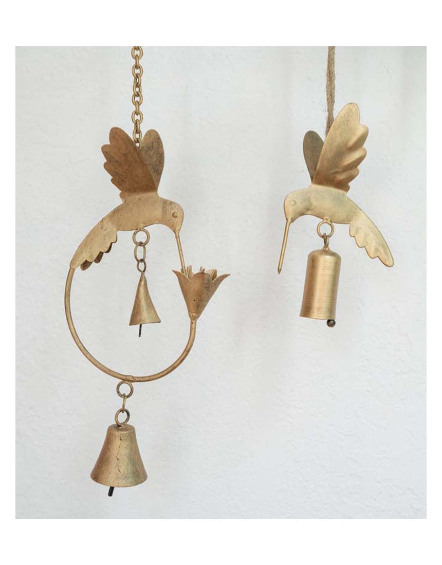 Matr Boomie Mitra hummingbird and lily wind chime with metal tubes and delicate bird and flower designs, hanging outdoors.