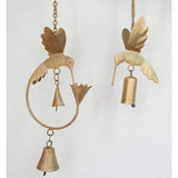 Matr Boomie Mitra hummingbird and lily wind chime with metal tubes and delicate bird and flower designs, hanging outdoors.