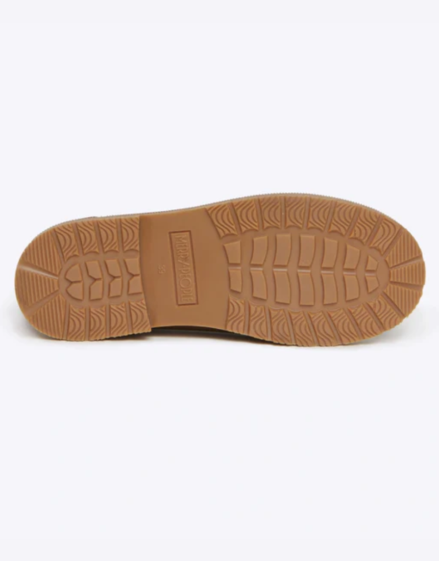 Rust-colored Merry People Bobbi gumboot shoes with a sturdy rubber sole and stylish waterproof design.