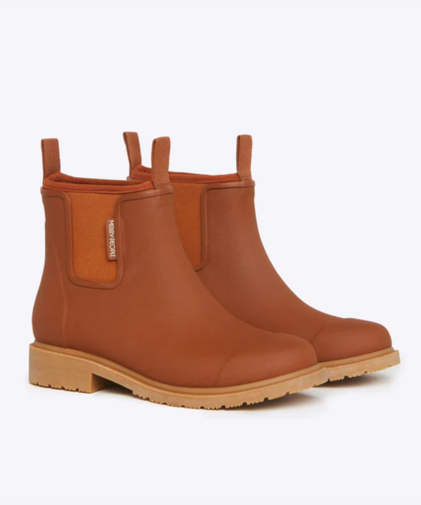 Rust-colored Merry People Bobbi Gumboot shoes with sturdy rubber soles, designed for rain and wet weather.