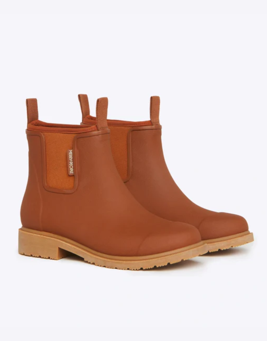 Rust-colored Merry People Bobbi Gumboot shoes with sturdy rubber soles, designed for rain and wet weather.