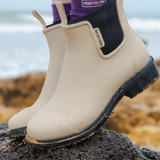 Merry People Bobbi Gumboot Sand shoes in tan with waterproof rubber soles and stylish design, perfect for rainy weather.