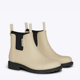 Merry People Bobbi Gumboot Sand shoes featuring durable rubber soles and stylish sand-colored waterproof design.