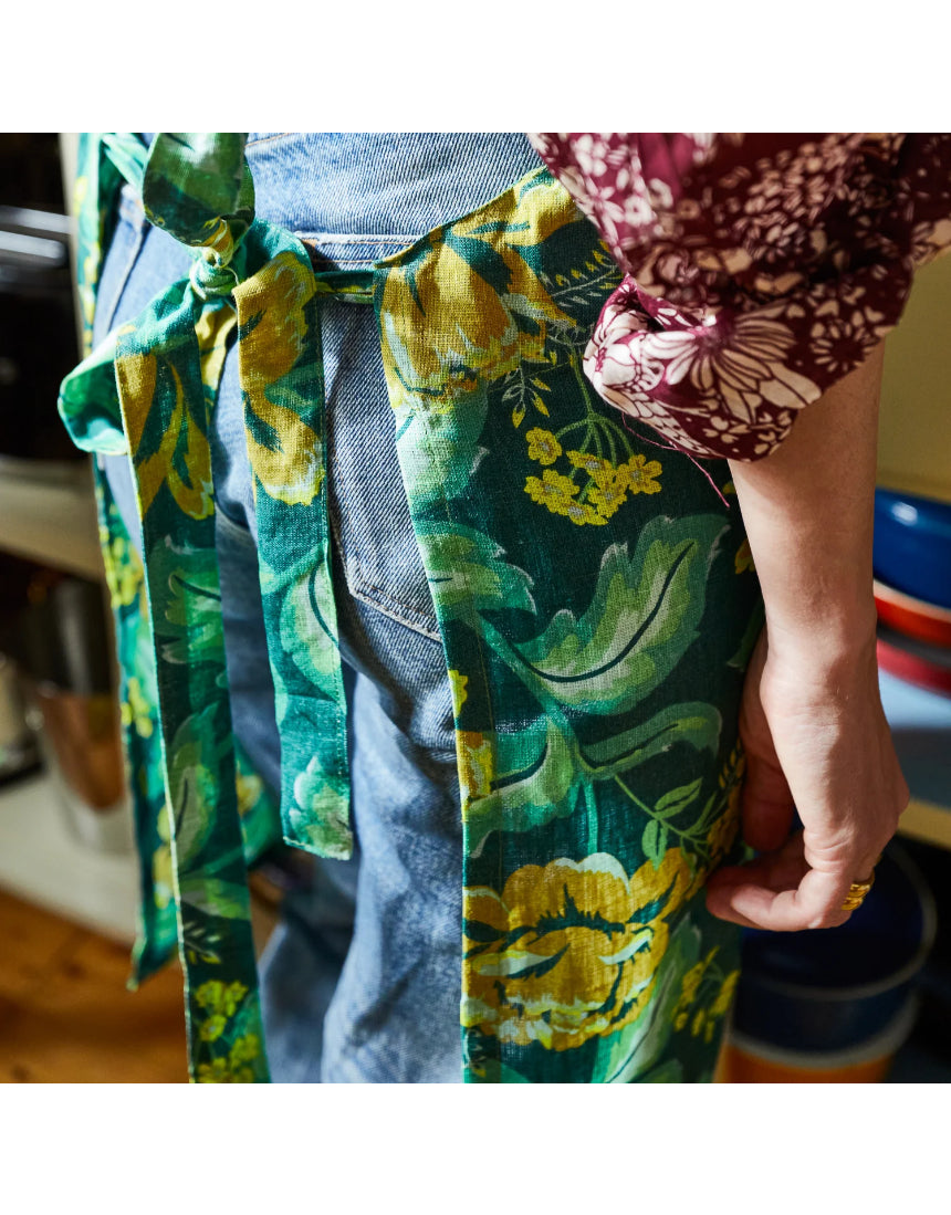 Sage x Clare Margot Linen Apron with adjustable neck strap and front pockets, featuring a stylish floral pattern.