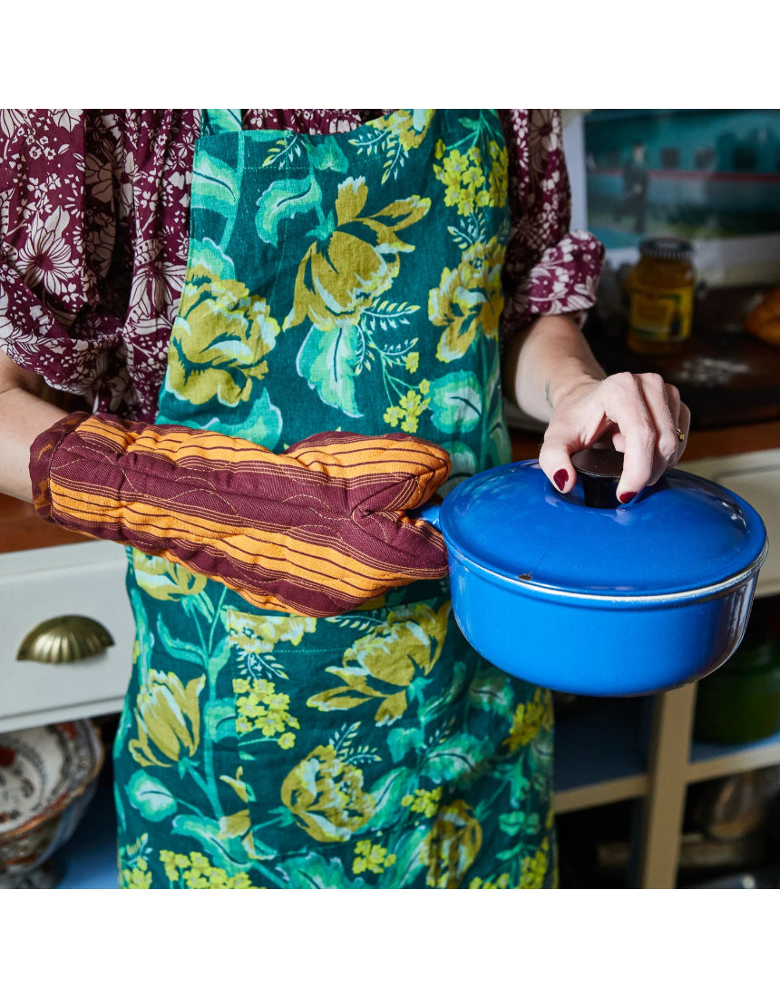 Sage x Clare Margot linen apron with adjustable neck strap and front pockets, featuring a stylish floral pattern.