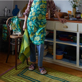 Sage x Clare Margot linen apron with waist ties and front pocket, featuring a stylish, lightweight design for cooking or baking.