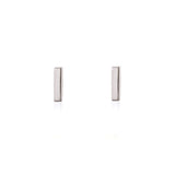Linda Tahija mini bar stud earrings in sterling silver, close-up of sleek, minimalist jewelry design.