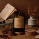 Mojo Candle Co. Autumn Lumiere limited edition candle with warm, seasonal autumn scent and decorative label.