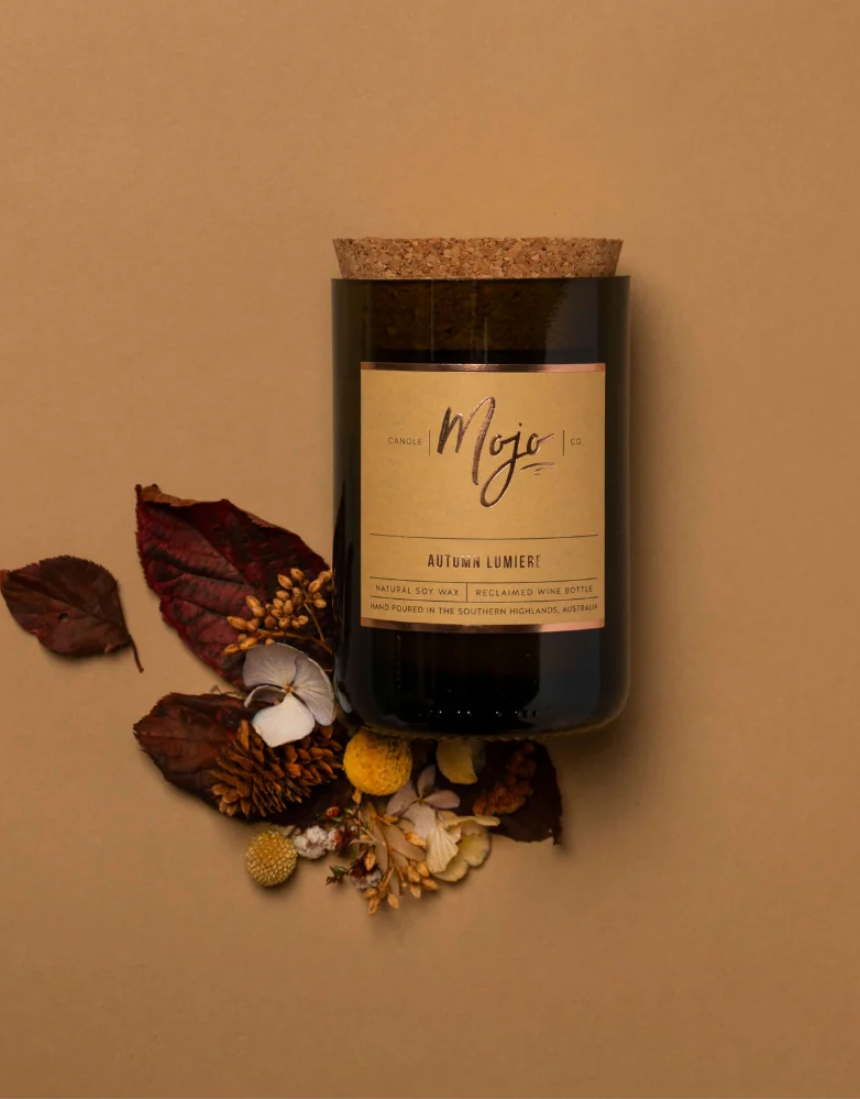Mojo Candle Co. Autumn Lumiere limited edition candle with warm autumn-inspired wax and elegant design.