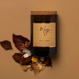 Mojo Candle Co. Autumn Lumiere limited edition candle with warm autumn-inspired wax and elegant design.