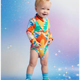 Halcyon Nights Mount Wiggly baby booties with colorful Wiggly character design, part of baby clothing set for infants.