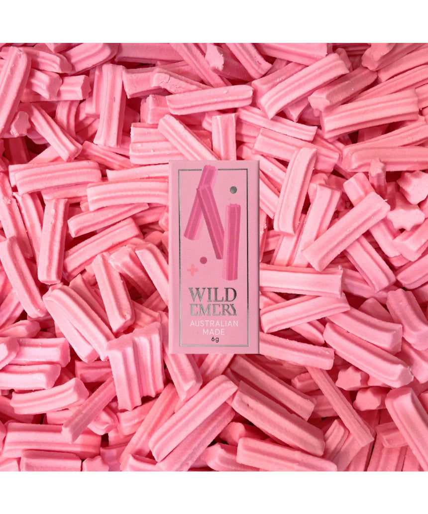 Wild Emery Musk Sticks Mini Lip Balm in a sleek lipstick tube with a natural musk scent.