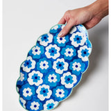 Jones & Co Poppy Blue Tray featuring a floral design with blue and white patterns on a wooden tray surface.