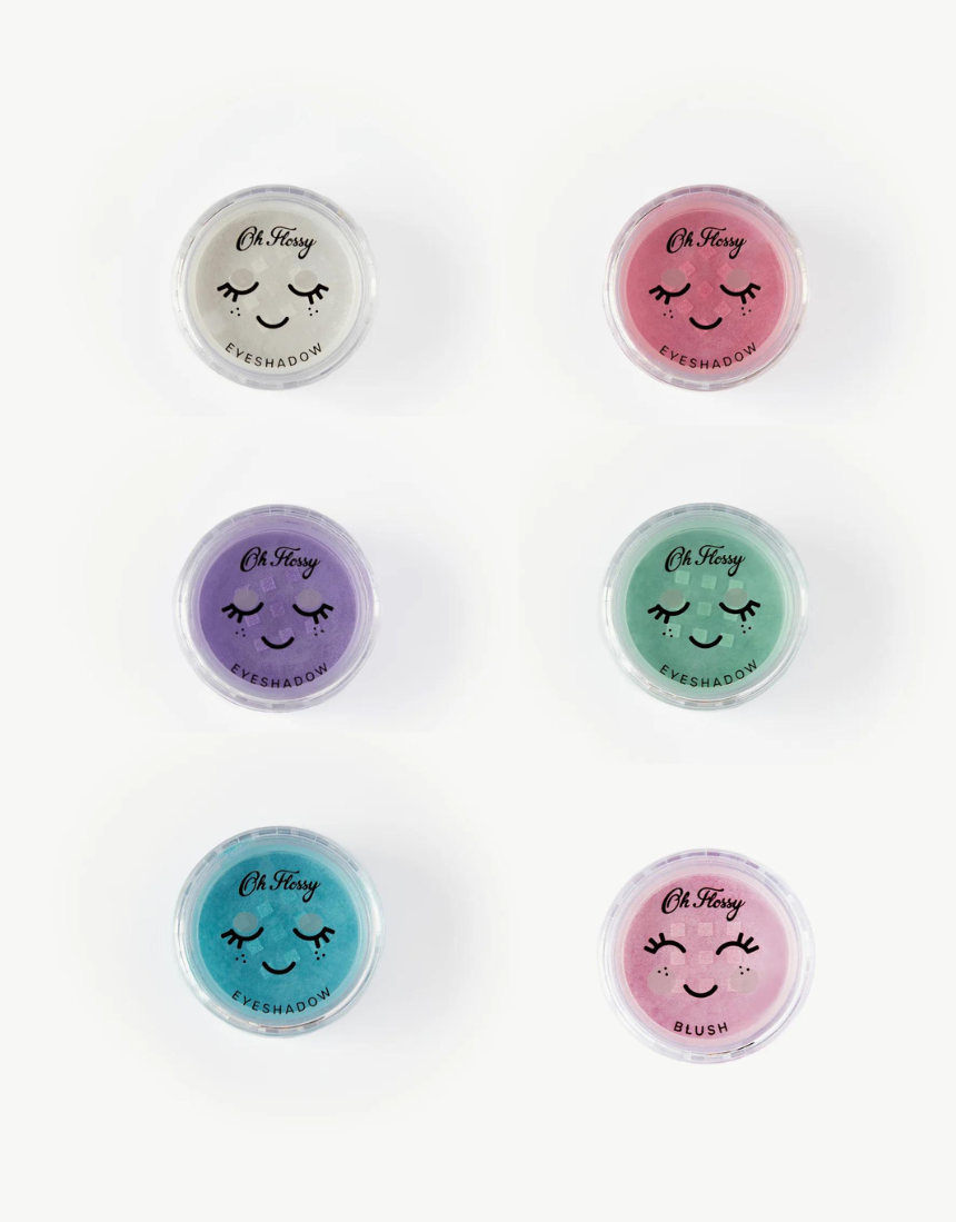 Kids' Oh Flossy Deluxe Makeup Set with colorful brushes, compacts, and accessories for imaginative play and beauty fun.