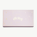 Kids Oh Flossy Deluxe Makeup Set with colorful toy makeup, brushes, and accessories for imaginative play.