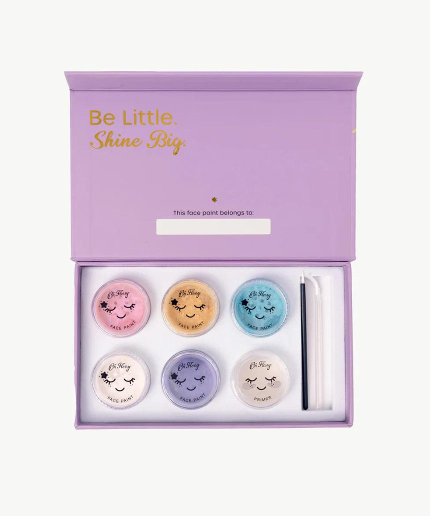 Kids face paint set by Oh Flossy featuring colorful garden-themed face paint sticks and brushes for creative fun.