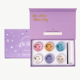 Kids face paint set from Oh Flossy featuring colorful garden-themed face paints and brushes for creative fun.