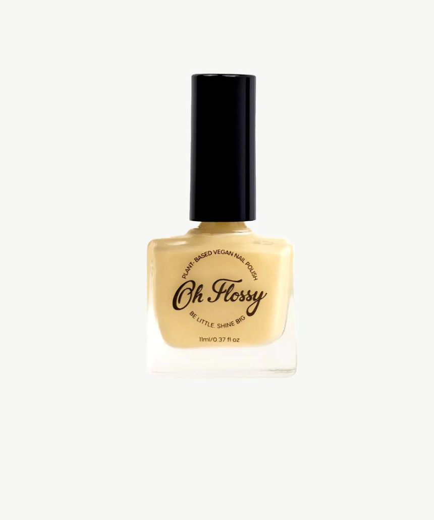 Kids nail polish by Oh Flossy in a creamy violet color, shown in a small bottle with a brush applicator.