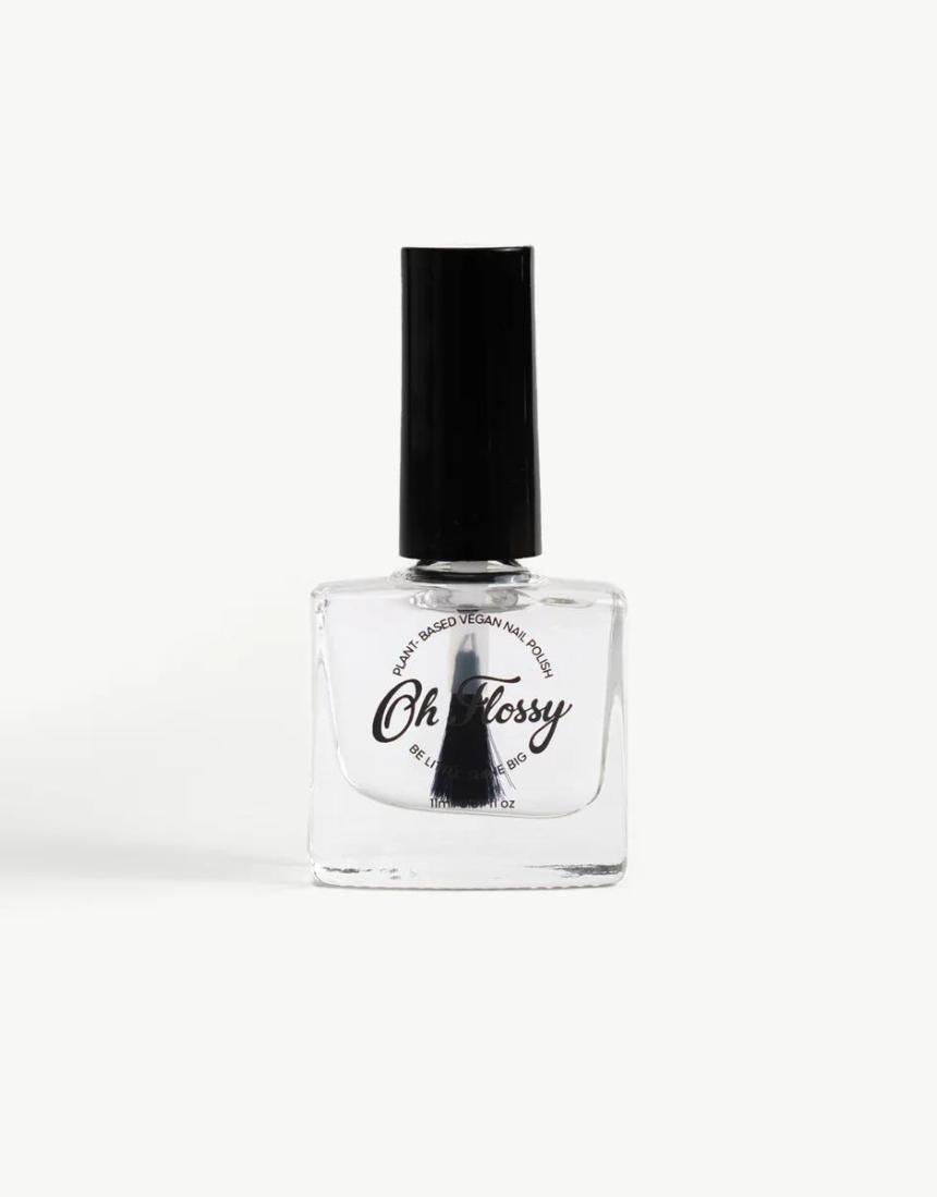 Kids' Oh Flossy nail polish in creamy violet, shown in a small bottle with a brush applicator, designed for children's nail art.