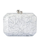 Olga Berg Mateo metallic silver clutch bag with sleek design and textured finish, perfect for evening events and formal occasions.