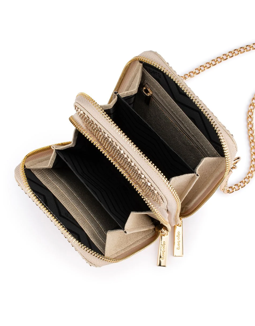 Olga Berg Elton mesh crossbody bag in gold with sleek design and adjustable strap, perfect for stylish everyday use.