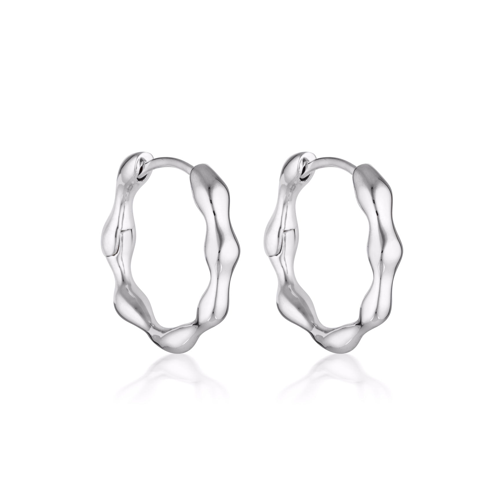 Sterling silver hoop earrings from Linda Tahija's Organica collection, featuring sleek, modern design and polished finish.
