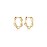 Linda Tahija Organica Mini Huggie Earrings in gold, close-up of small, stylish hoop earrings with a sleek finish.