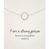 Silver and rose gold Petals Australia "I Am A Strong Person" necklace with delicate petal pendant on chain.