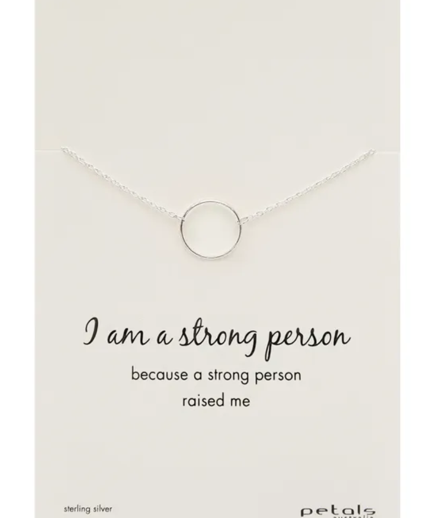 Petals Australia silver and rose gold necklace with a pendant engraved "I Am A Strong Person" for empowerment.