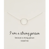 Petals Australia silver and rose gold necklace with a pendant engraved "I Am A Strong Person" for empowerment.