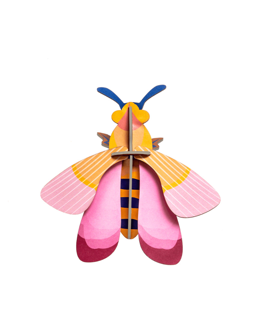Pink bee wall decor from Studio Roof featuring a vibrant, detailed pink bee illustration on a plain background.