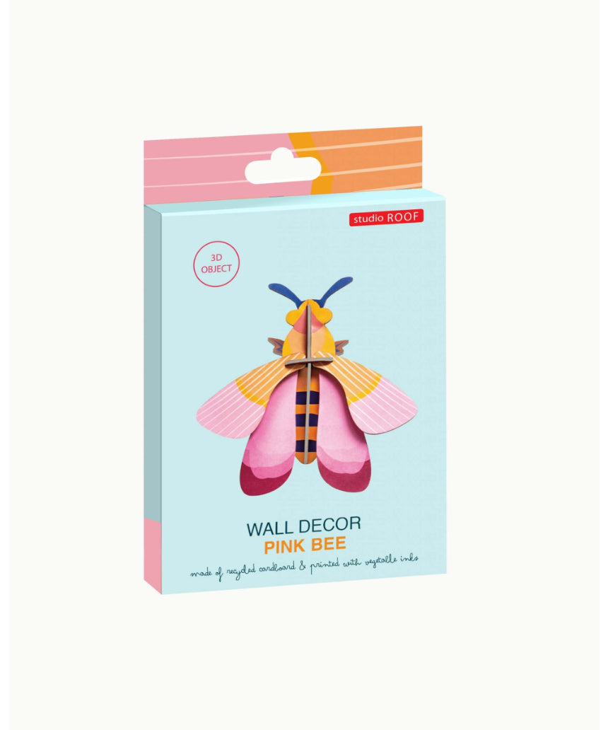Pink bee wall art from Studio Roof, vibrant pink wall decor featuring a detailed bee design for modern home decoration.