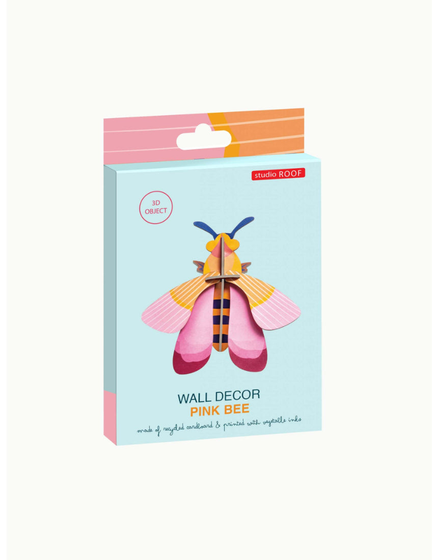 Pink bee wall art from Studio Roof, vibrant pink wall decor featuring a detailed bee design for modern home decoration.