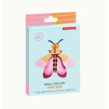 Pink bee wall art from Studio Roof, vibrant pink wall decor featuring a detailed bee design for modern home decoration.