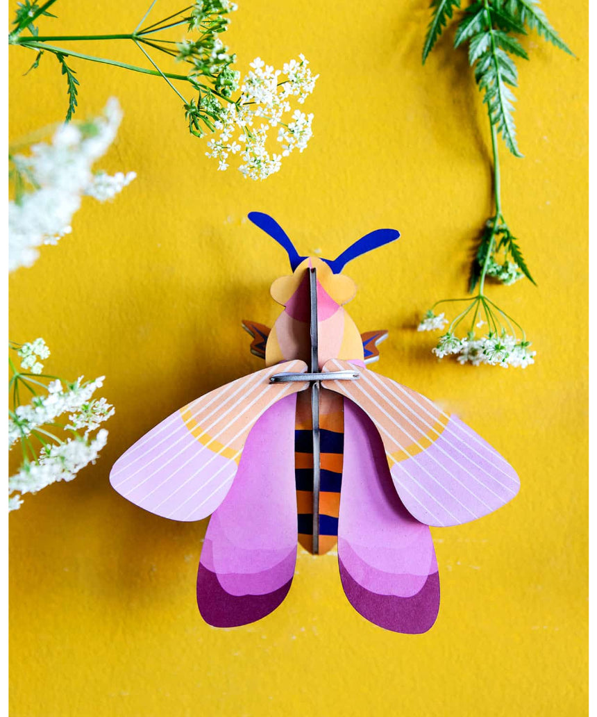 Pink bee wall decor by Studio Roof featuring vibrant pink colors and detailed design, perfect for modern wall art accents.