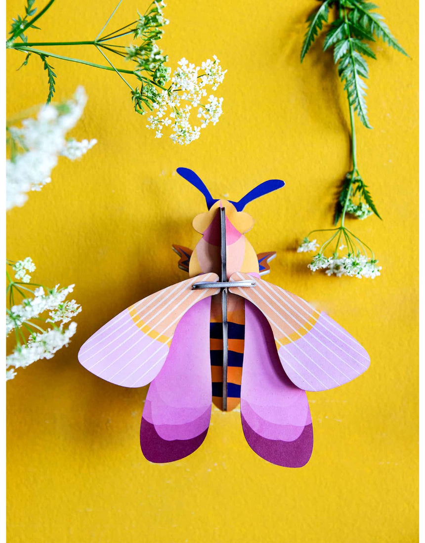 Pink bee wall decor by Studio Roof featuring vibrant pink colors and detailed design, perfect for modern wall art accents.