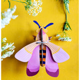 Pink bee wall decor by Studio Roof featuring vibrant pink colors and detailed design, perfect for modern wall art accents.
