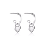 Silver Linda Tahija Amore Core Hoop Earrings with puff-heart design, showcasing elegant and modern hoop jewelry.