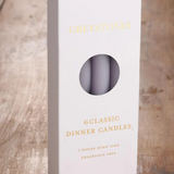 Six River Road Misty Moor dinner candles arranged in a pack, showcasing elegant white wax candles for dining or decor.