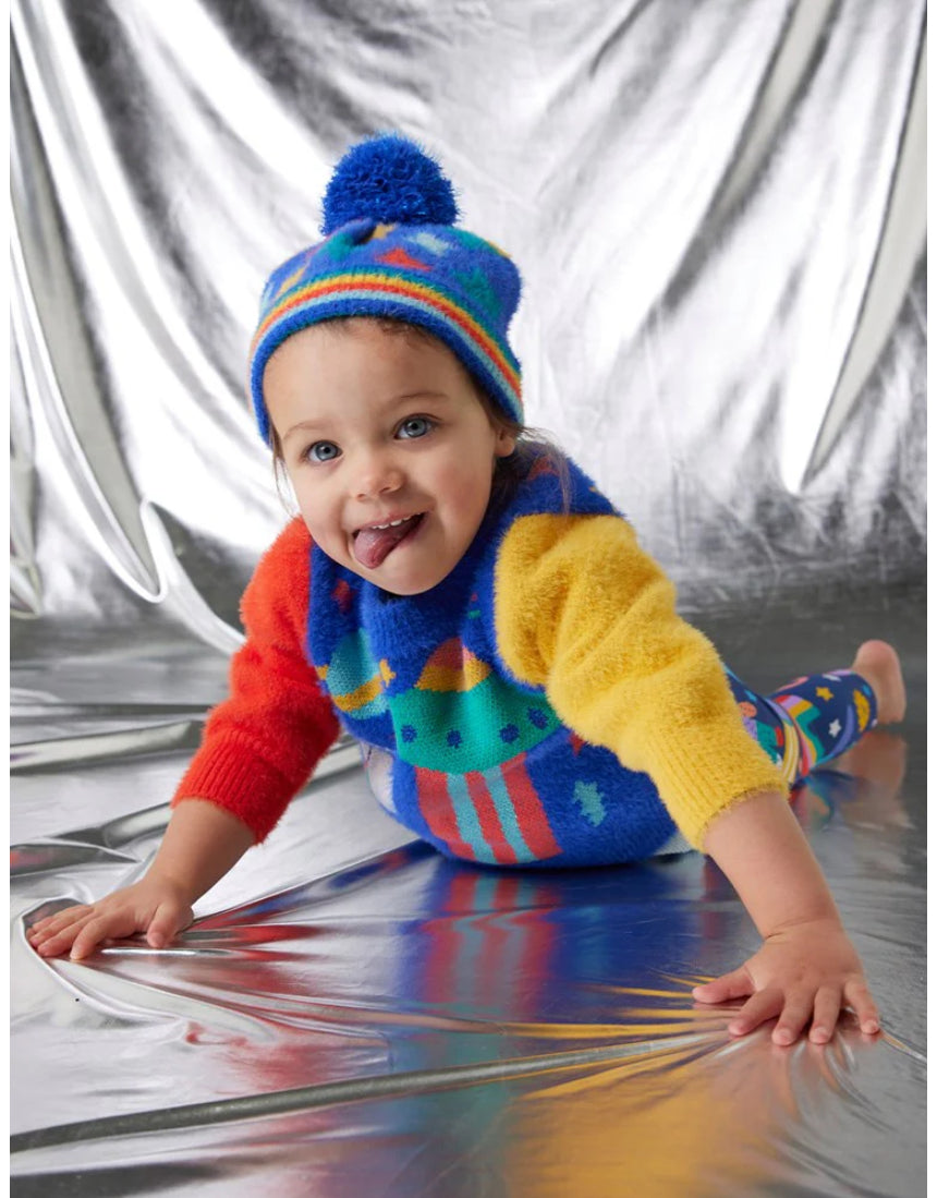 Halcyon Nights Rocket Ride knit beanie hat with colorful rocket and star pattern, cozy and stylish winter accessory.