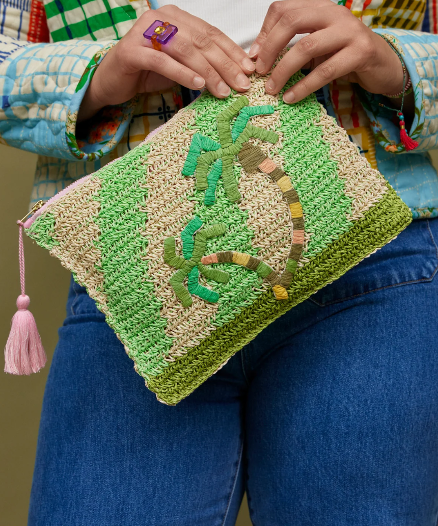 Sage x Clare San Carlos Rafia Clutch with woven texture and neutral tones, showcasing its stylish and handcrafted design.