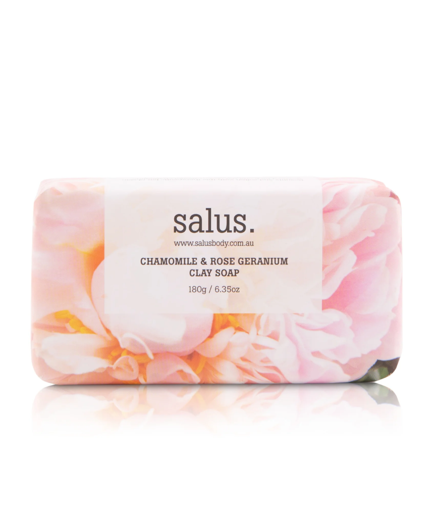 Salus Chamomile and Rose Geranium Clay Soap for bath and body, showing the soap bar with floral ingredients and packaging.