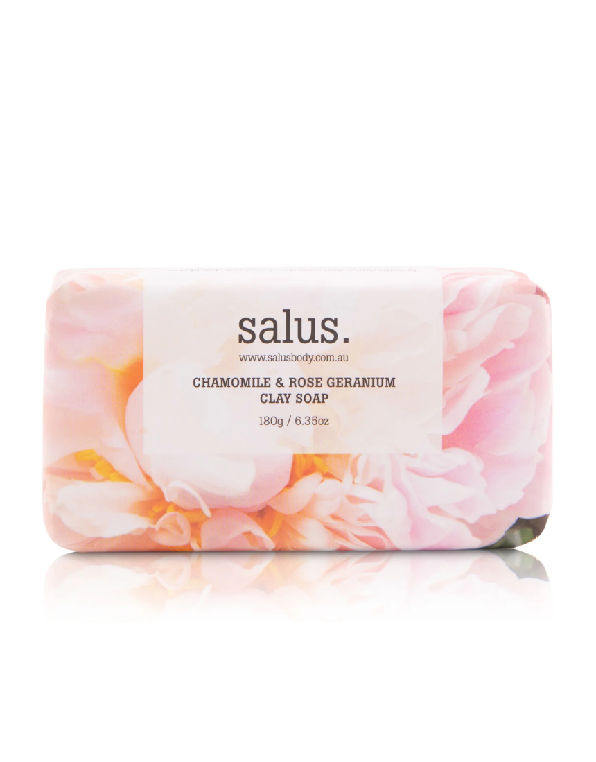Salus Chamomile and Rose Geranium Clay Soap for bath and body, showing the soap bar with floral ingredients and packaging.