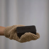 Salus Body exfoliation mitt for body scrub, beige bath accessory with textured surface for smooth, refreshed skin.