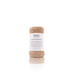 Salus Body exfoliation mitt for body scrubbing, bath accessory with textured surface for smooth, refreshed skin.
