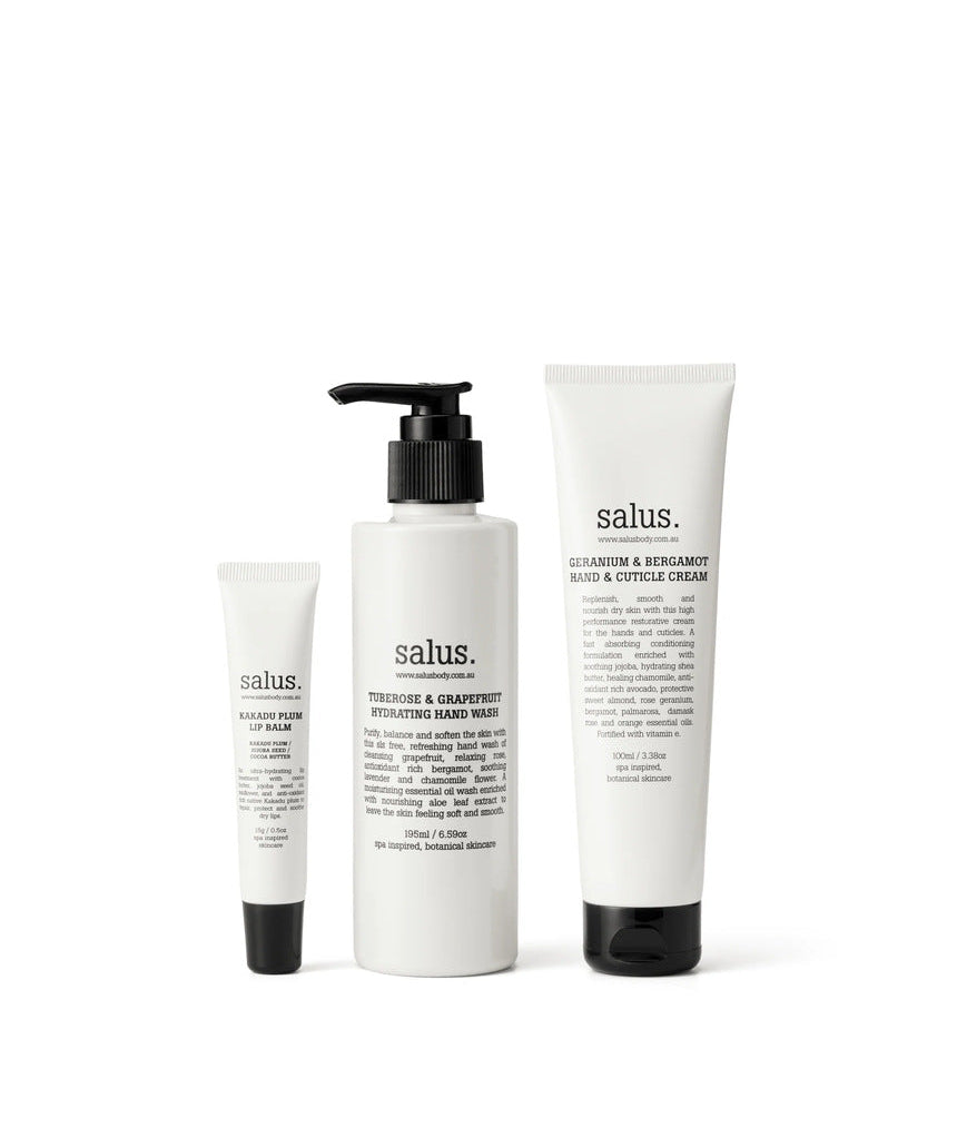 Salus Body Hand & Lip Replenishing Trio gift set with hand cream and lip balm in decorative packaging.