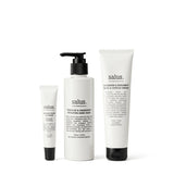 Salus Body Hand & Lip Replenishing Trio gift set with hand cream and lip balm in decorative packaging.