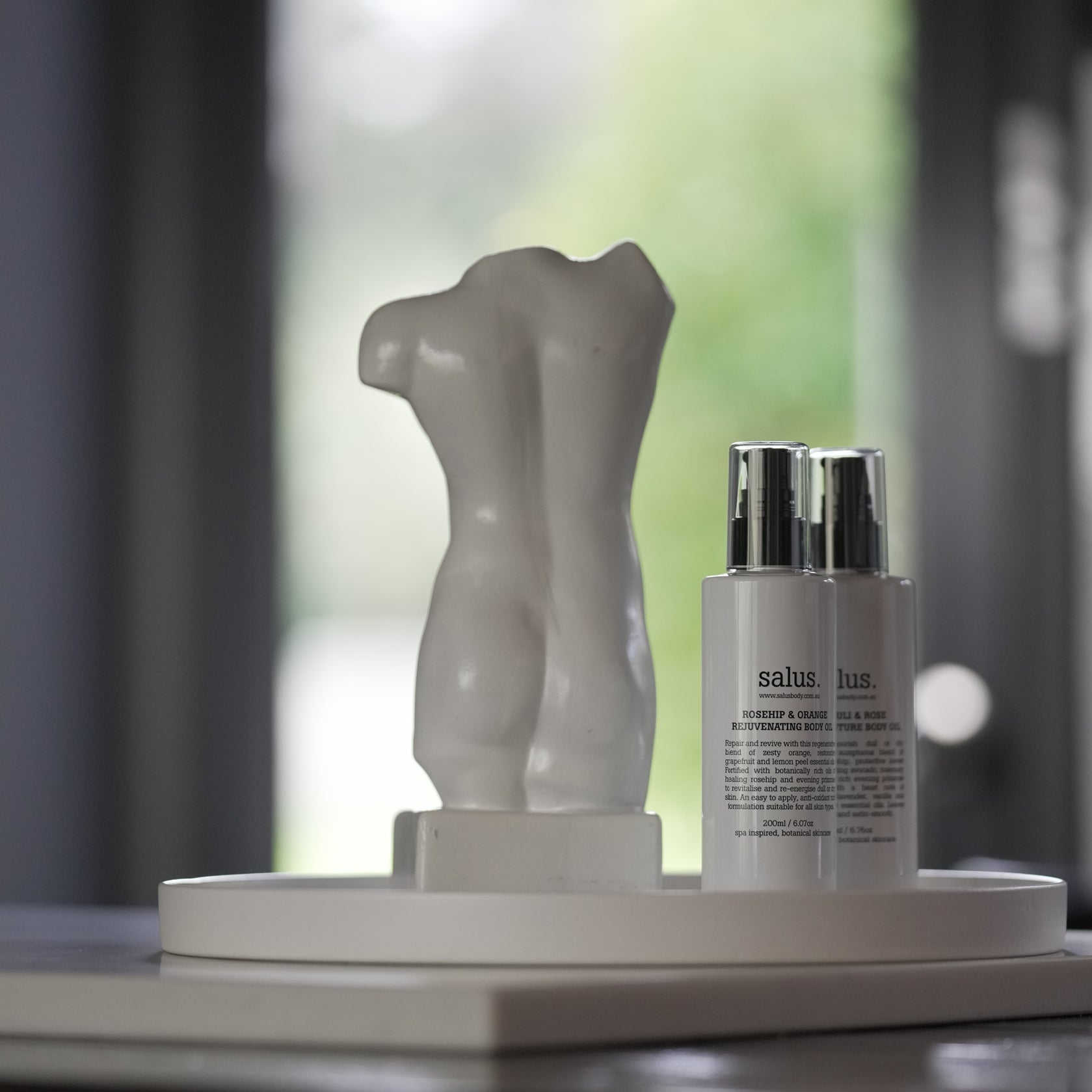 Salus Rosehip & Orange Rejuvenating Body Oil 200ml bottle with a natural, vibrant orange and rosehip imagery on the label