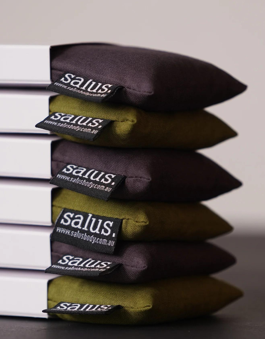 Salus Aromatherapy Eye Pillow in moss green with soft fabric cover, designed for relaxation and soothing eye comfort.